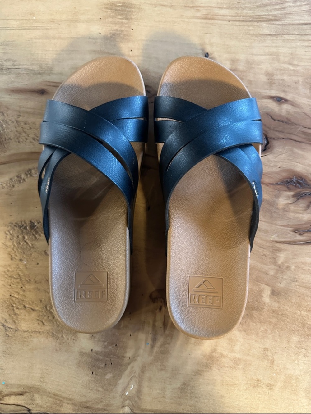 Reef Women's Black Leather Crisscross Slide Sandals with Tan Footbed